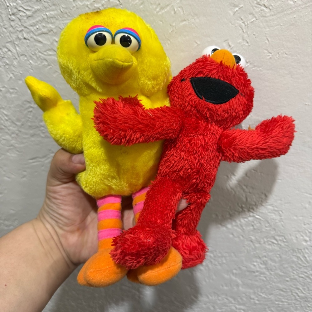 Lot of 2 Sesame Street Plush Characters Big Bird see staining and Elmo